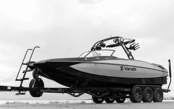 Black and white photo of Varatti wake boat on trailer