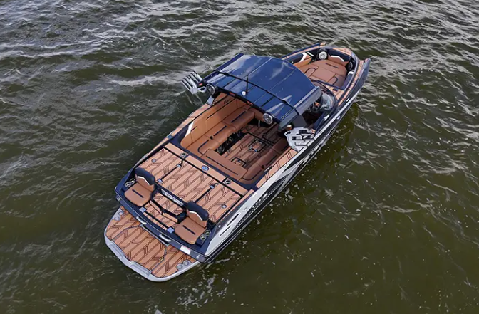 Top-down aerial view of wooden deck boat on lake