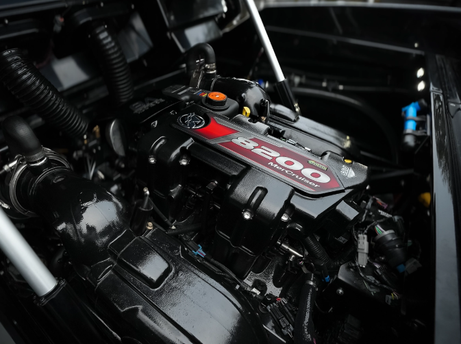 High-performance marine engine detail inside wake boat